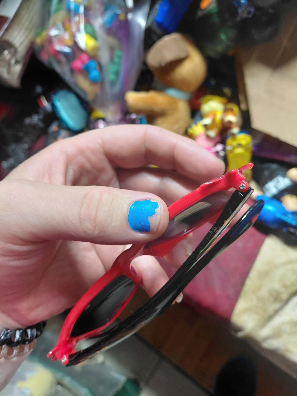 Nintendo Pokémon Pikachu sunglasses feature a red frame with a Poké Ball pattern